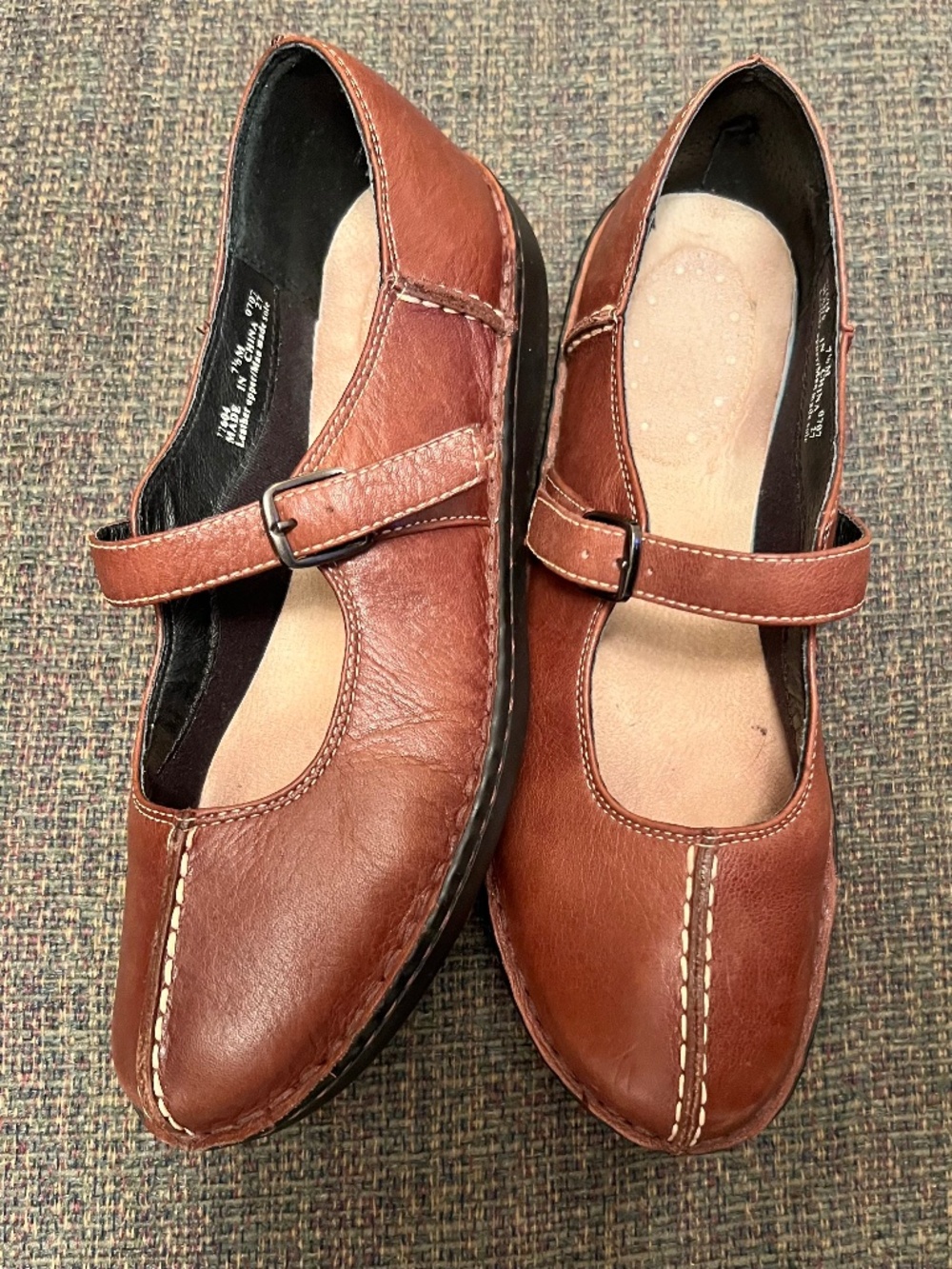 Clark’s Mary Jane’s brown leather flats